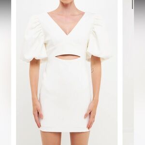 White puff sleeved cut out mini dress